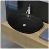 Image de Lavabo ovale en céramique noir avec trop plein 59 x 38,5 cm