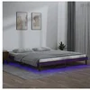Image de Bedframe LED massief hout honingbruin 140x190 cm820654