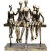 Image de Statuette famille sur un banc en polyrésine bronze