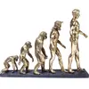 Image de Statuette évolution de l'homme en polyrésine dorée