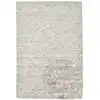 Image de Tapis tissé à la main en laine naturelle sable 140x200