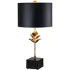 Image de Lampe de table en métal et résine noir et doré