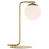 Image de Lampe de table dorée de style nordique et boule de verre blanche