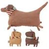 Image de Peluche avec chiots en coton et en polyester H36x35x16cm / H17x14x6cm