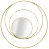 Image de Miroir de mur avec des cercles en métal doré Ø 80x3,5 cm