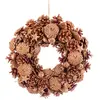 Image de Couronne de l'avent décoration noël pommes de pin dorées
