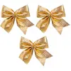 Image de Set de 3 noeuds dorés pour décoration sapin de noël 10cm