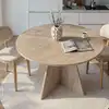 Image de Table à manger 4 personnes ronde effet travertin - beige