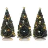 Image de Village de noël miniature vert plastique h15xl9xl9cm