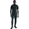Image de Pantalon de football Nike pour hommes, technologie Therma-FIT, couleur vert émeraude/vert clair, taille L