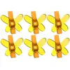 Image de Sachet de 6 Papillons plastique sur pince, translucide Jaune