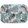 Image de Grand plateau mÃ©tal Feuilles tropicales 34 cm