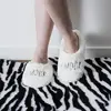 Image de Chaussons Sherpa Creme