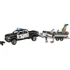 Image de BRUDER RAM 2500 Police Pickup avec remorque et bateau - 1:16 - noir/blanc - 2 figurines