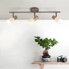 Image de BRILLIANT Tube spot Luca | spot de plafond rustique | métal/verre | vieux cuivre | orientable | 3x E14 max. 40 W