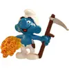 Image de Les Schtroumpfs : Schtroumpf fermier avec sa faux Figurine 5,5cm - Schleich 21010