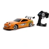 Image de Jada Toys Fast & Furious RC-Auto, Drift 1995 Toyota Supra, Turbo, fonction drift, 4 roues motrices, voiture télécommandée, télécommande radio 2 canaux, fonction de charge USB, 4 roues de secours, 1:10, orange