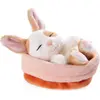Image de Doudou lapin caramel 12cm à pois dormant dans son panier peach