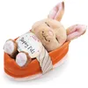 Image de NICI 61584 Doudou lapin avec carotte 12cm dans un panier couleur pêche