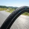 Image de Pneu Schwalbe Marathon Racer HS429 28x1,35" 35-622 noir/noir-skin Réf. RG AdxG