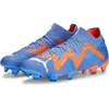 Image de PUMA Future Ultimate FG/AG Chaussures de football femme 01 - blue glimmer/puma white/ultra orange 37