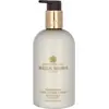 Image de Molton Brown, Lait pour le corps "Mesmerising Oudh Accord & Gold".