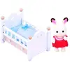 Image de Sylvanian Families: Lapin Chocolat bébé tout lit Figurine 5 cm - Epoch Toys Figurine - EPL5017