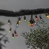Image de Guirlande lumineuse LED de fête - 16 petites boules colorées - L : 4,5m - câble noir - extérieur
