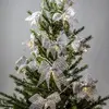 Image de Guirlande lumineuse décorative à piles « Bowie », 10 nuds en tissu argenté, LED, minuterie, lumière blanc chaud, L 225 cm