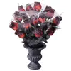 Image de Vase avec Roses rouges et Toile d'AraignÃ©e