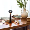 Image de Lampe de table LED Zafferano Angelina noire, rechargeable sans fil, tête réglable, tactile, parfaite pour intérieur élégant