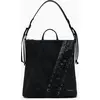 Image de Mini-sac à dos élégant en noir avec détails contrastés et logo
