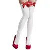 Image de Bas blancs avec noeud rouge - Femme