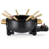 Image de Tristar FO-1108 Service à fondue en bambou 1,5 L pour 8   Caquelon multifonction pour huile, fromage et chocolat, inclut 8 fourchettes et un anneau anti-éclaboussures, design élégant en occasion ou reconditionné