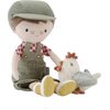 Image de Jim, le petit fermier de Little Dutch, et sa poule