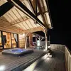 Image de Nuit en Cabane sur Pilotis avec Jacuzzi Privatif près de Laval