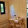 Image de Cabane sur Pilotis avec Jacuzzi Privatif près de Périgueux