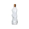 Image de Ferm Living - Carafe Dimple - Transparent - Liège - Designer Trine Andersen