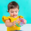 Image de Hochet balle souple Rose/Lila/Vert