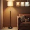 Image de VASAGLE Lampadaire, Lampe sur Pied, Hauteur Réglable de 140 à 170 cm, Style Moderne, Interrupteur à Pied, Abat-Jour en Tissu, Douille E27, Doré et Noir LFL002B02