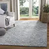 Image de SAFAVIEH Tapis Contemporain pour Salon, Salle à Manger, Chambre à Coucher - Abstract Collection, Tapis à Poil Court, Bleu et Ivoire, 122 X 122 cm