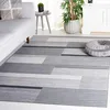 Image de SAFAVIEH Tapis Moderne pour Salon, Salle à Manger, Chambre à Coucher - Odyssey Collection, Tapis à Poil Court, Gris et Noir, 122 X 183 cm