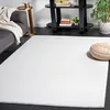 Image de Safavieh Tapis Contemporain pour Salon, Salle à Manger, Chambre à Coucher - River Collection, Tapis à Poil Court, Ivoire, 152 x 229 cm
