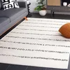Image de Safavieh Tapis Géométrique pour Salon, Salle à Manger, Chambre à Coucher - Melody Collection, Tapis à Poil Court, Ivoire et Noir, 122 x 183 cm