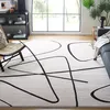 Image de SAFAVIEH Tapis géométrique pour Salon, Salle à Manger, Chambre à Coucher - Melody Collection, Tapis à Poil Court, Ivoire et Noir, 244 X 305 cm