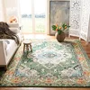 Image de SAFAVIEH Tapis Boho pour Salon, Salle à Manger, Chambre à Coucher - Monaco Collection, Tapis à Poil Court, Vert forêt et Bleu Clair, 61 X 91 cm