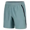 Image de Under Armour Launch 7' Shorts Hommes, Short Homme Ultra-léger, Short Gym Respirant et au séchage Rapide, Blue Atlantis/Washed Navy/Reflective, XL