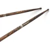 Image de Baguettes ProMark - Baguettes FireGrain signature Larnell Lewis 5AB - Lot de baguettes - Grosse olive ronde en bois - Hickory avec finition vernie - 1 paire