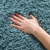 Image de SAFAVIEH Tapis Shag Pour Salon, Salle à manger, Chambre à coucher - California Shag Collection, Tapis à poil long, Bleu clair, 122 X 183 cm
