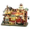 Image de LEMAX Bâtiment en Mouvement et Musique Christmas Cake Factory en résine H24.5 x 27.8 x 17.7 cm